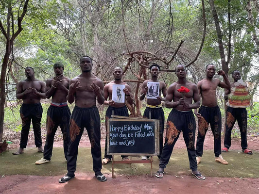 African Lion Team delivering personalized birthday greeting with custom chalkboard
