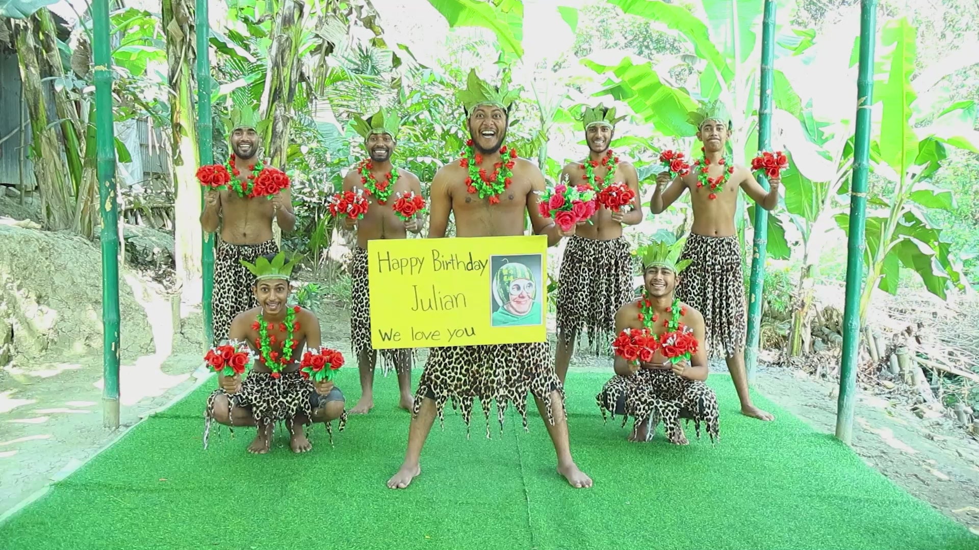 Bangladeshi Love Team performing a romantic personalized greeting with traditional South Asian music and a custom sign