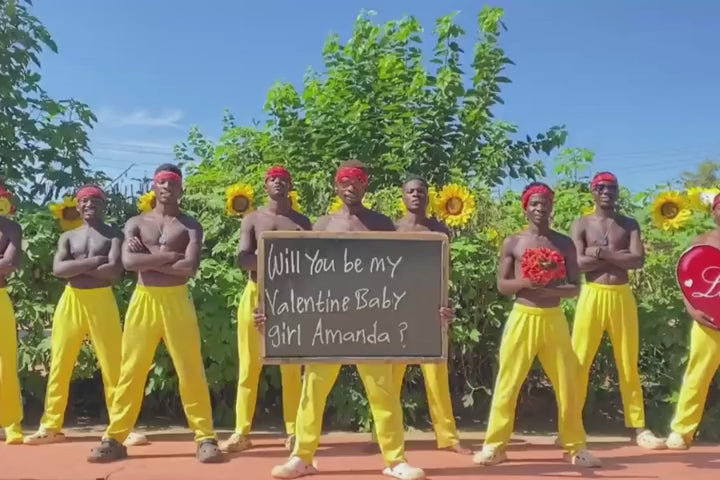 African B-Boys in signature yellow pants performing a romantic breakdance routine for a Valentine's Day video
